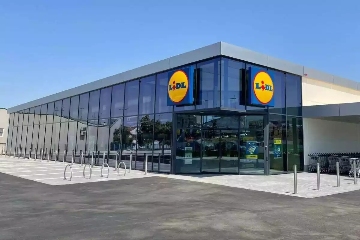 Exterior of a newly built Lidl store with the logo and shiny windows Exterior of a newly built Lidl store with the logo and shiny windows