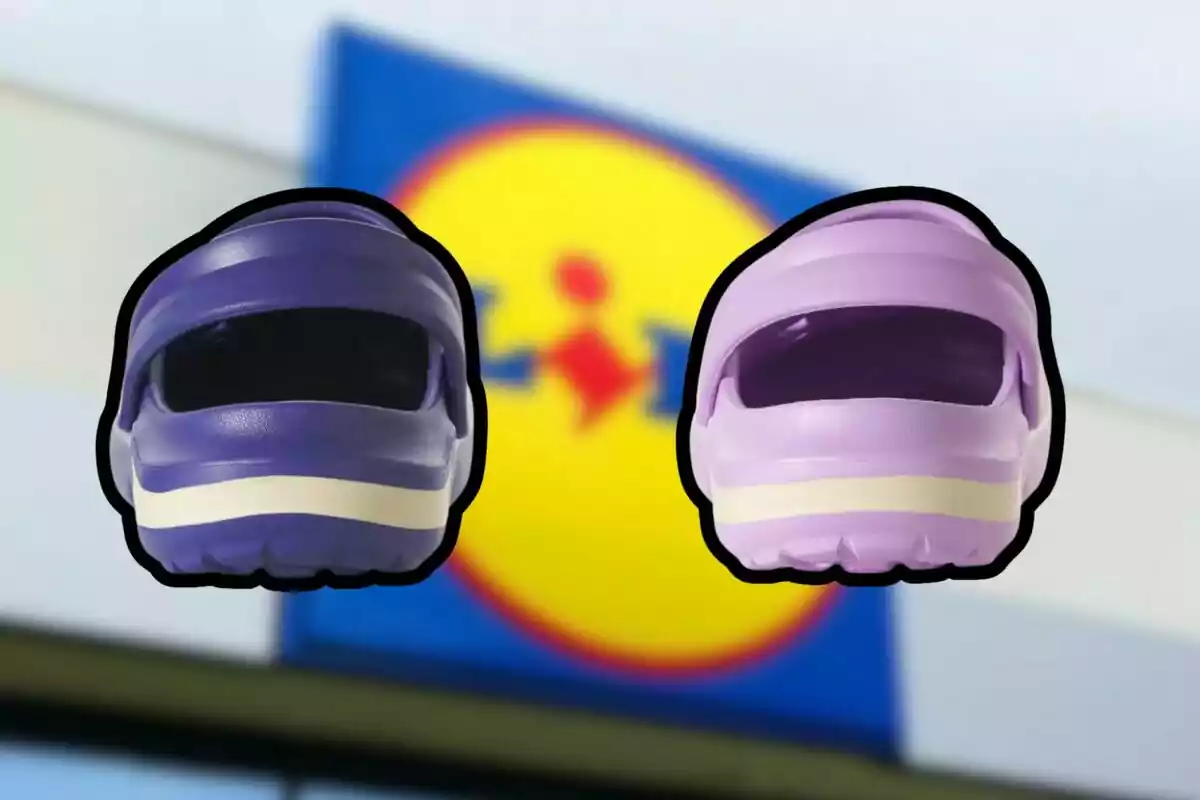 Two Crocs-style sandals in purple and lilac in front of a blurry Lidl store sign Two Crocs-style sandals in purple and lilac in front of a blurry Lidl store sign
